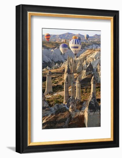 Turkey, Anatolia, Cappadocia, Goreme. Hot air balloons above Red Valley.-Emily Wilson-Framed Photographic Print