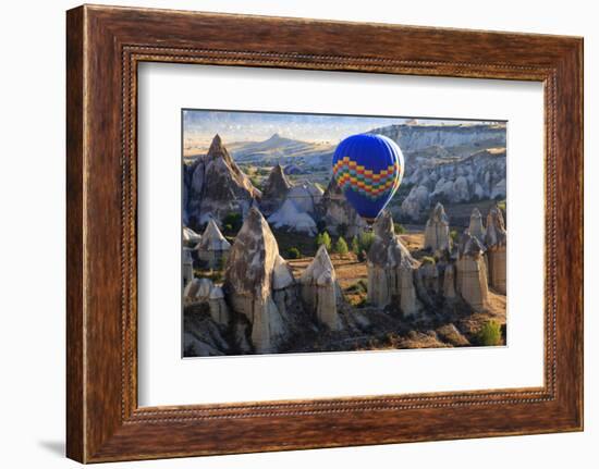 Turkey, Anatolia, Cappadocia, Goreme. Hot air balloons flying above the valley.-Emily Wilson-Framed Photographic Print