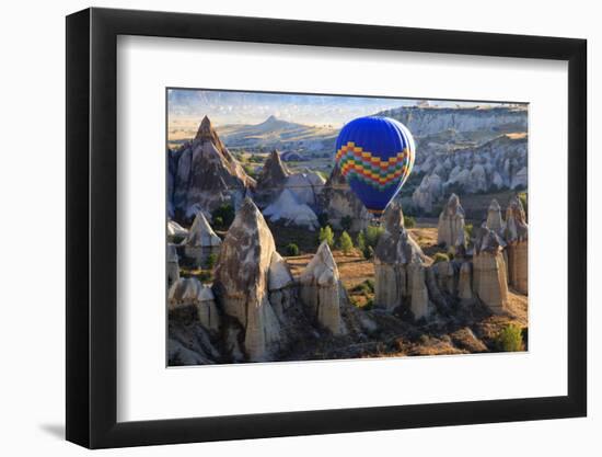 Turkey, Anatolia, Cappadocia, Goreme. Hot air balloons flying above the valley.-Emily Wilson-Framed Photographic Print