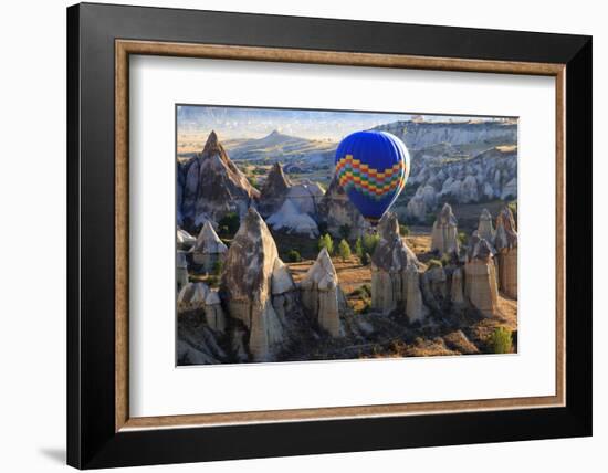 Turkey, Anatolia, Cappadocia, Goreme. Hot air balloons flying above the valley.-Emily Wilson-Framed Photographic Print