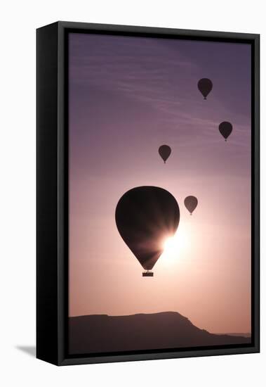 Turkey, Anatolia, Cappadocia, Goreme. Hot air balloons flying above the valley.-Emily Wilson-Framed Premier Image Canvas