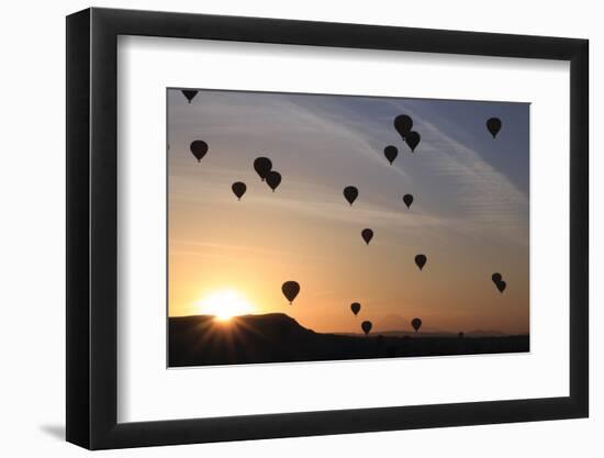 Turkey, Anatolia, Cappadocia, Goreme. Hot air balloons flying above the valley.-Emily Wilson-Framed Photographic Print