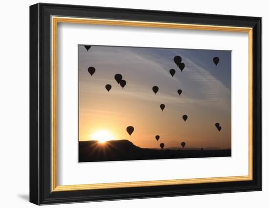 Turkey, Anatolia, Cappadocia, Goreme. Hot air balloons flying above the valley.-Emily Wilson-Framed Photographic Print