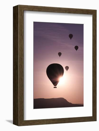 Turkey, Anatolia, Cappadocia, Goreme. Hot air balloons flying above the valley.-Emily Wilson-Framed Photographic Print