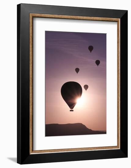 Turkey, Anatolia, Cappadocia, Goreme. Hot air balloons flying above the valley.-Emily Wilson-Framed Photographic Print