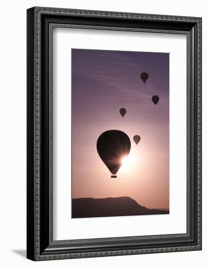 Turkey, Anatolia, Cappadocia, Goreme. Hot air balloons flying above the valley.-Emily Wilson-Framed Photographic Print