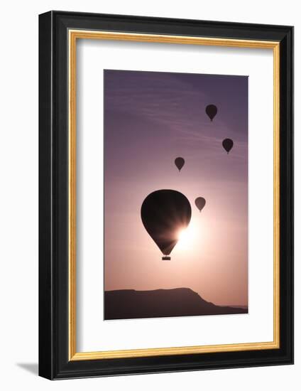 Turkey, Anatolia, Cappadocia, Goreme. Hot air balloons flying above the valley.-Emily Wilson-Framed Photographic Print