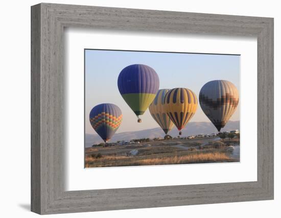 Turkey, Anatolia, Cappadocia, Goreme. Hot air balloons flying above the valley.-Emily Wilson-Framed Photographic Print