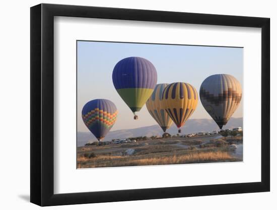 Turkey, Anatolia, Cappadocia, Goreme. Hot air balloons flying above the valley.-Emily Wilson-Framed Photographic Print