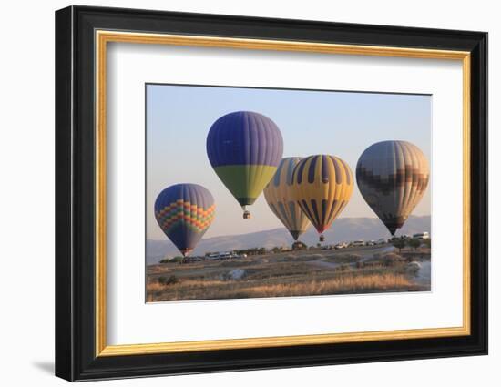 Turkey, Anatolia, Cappadocia, Goreme. Hot air balloons flying above the valley.-Emily Wilson-Framed Photographic Print