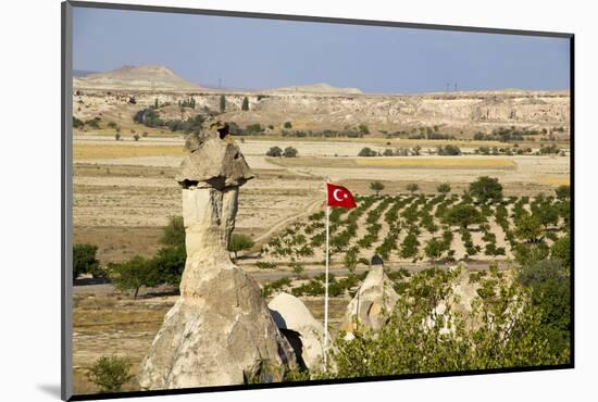 Turkey, Cappadocia. Turkish Flag Is Flying over Pomegranate Orchards-Emily Wilson-Mounted Photographic Print