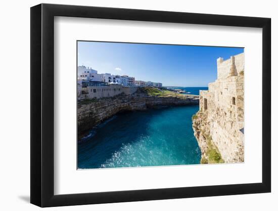 Turquoise sea framed by the old town perched on the rocks, Polignano a Mare, Province of Bari, Apul-Roberto Moiola-Framed Photographic Print