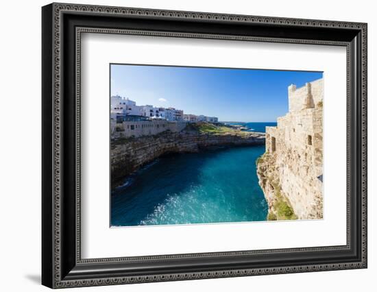 Turquoise sea framed by the old town perched on the rocks, Polignano a Mare, Province of Bari, Apul-Roberto Moiola-Framed Photographic Print