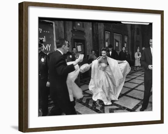 TV Actress Sandra White Laughing with Embarrassment Upon Arriving Late at the Academy Awards-Loomis Dean-Framed Premium Photographic Print