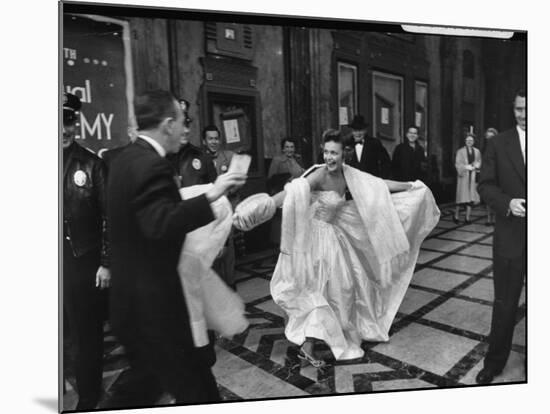 TV Actress Sandra White Laughing with Embarrassment Upon Arriving Late at the Academy Awards-Loomis Dean-Mounted Premium Photographic Print