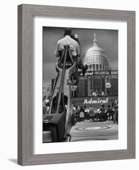 TV Camera Unit Operating Above Busy Election Eve Newsroom-Al Fenn-Framed Photographic Print