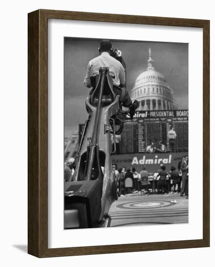 TV Camera Unit Operating Above Busy Election Eve Newsroom-Al Fenn-Framed Photographic Print