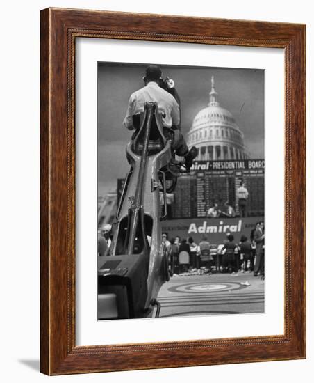 TV Camera Unit Operating Above Busy Election Eve Newsroom-Al Fenn-Framed Photographic Print