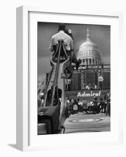 TV Camera Unit Operating Above Busy Election Eve Newsroom-Al Fenn-Framed Photographic Print