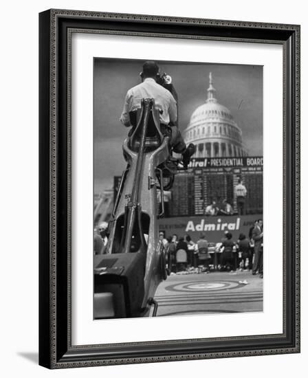 TV Camera Unit Operating Above Busy Election Eve Newsroom-Al Fenn-Framed Photographic Print