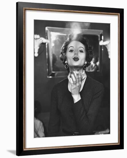 TV Model Nancy Driver Showing Correct Smoking Technique For TV Commercial-Peter Stackpole-Framed Photographic Print