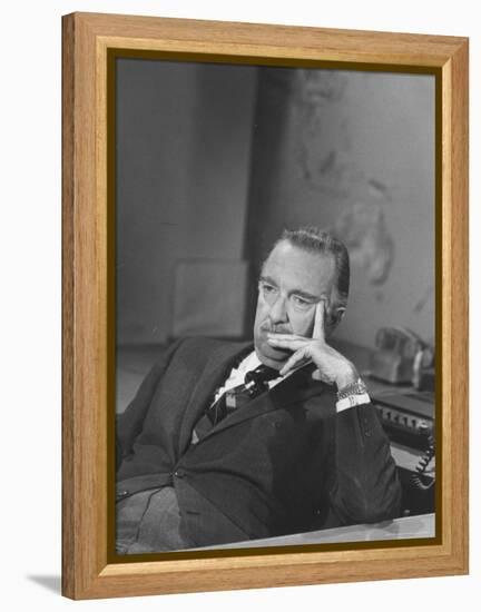 TV Newscaster Walter Cronkite, Preparing for His TV Show-Leonard Mccombe-Framed Premier Image Canvas