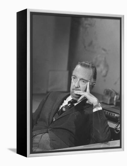 TV Newscaster Walter Cronkite, Preparing for His TV Show-Leonard Mccombe-Framed Premier Image Canvas