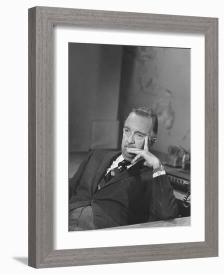 TV Newscaster Walter Cronkite, Preparing for His TV Show-Leonard Mccombe-Framed Premium Photographic Print