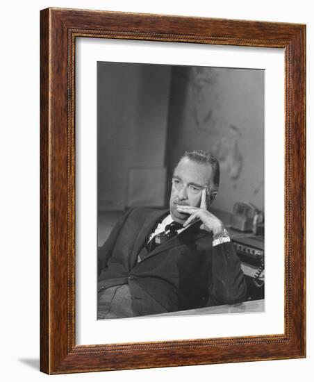 TV Newscaster Walter Cronkite, Preparing for His TV Show-Leonard Mccombe-Framed Premium Photographic Print