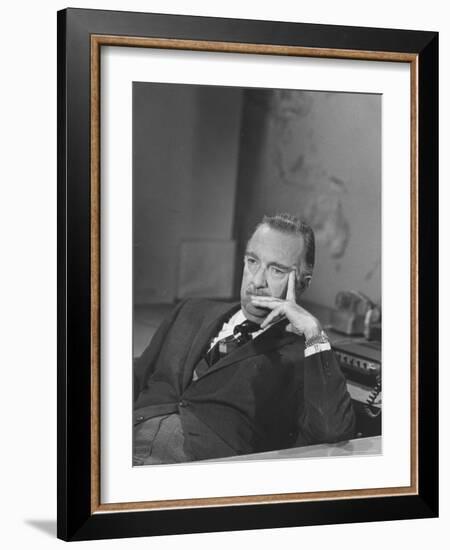 TV Newscaster Walter Cronkite, Preparing for His TV Show-Leonard Mccombe-Framed Premium Photographic Print