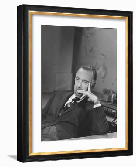 TV Newscaster Walter Cronkite, Preparing for His TV Show-Leonard Mccombe-Framed Premium Photographic Print