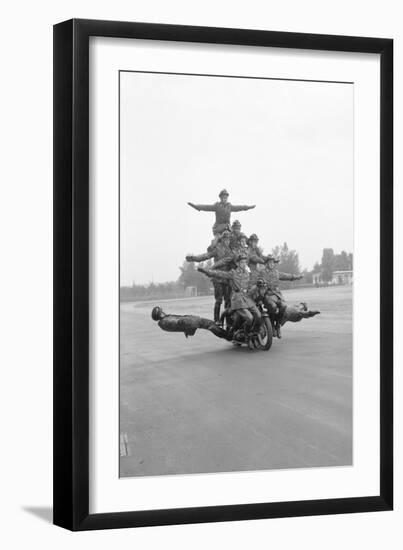 Twelve Policemen Riding One Motorcycle-null-Framed Photographic Print