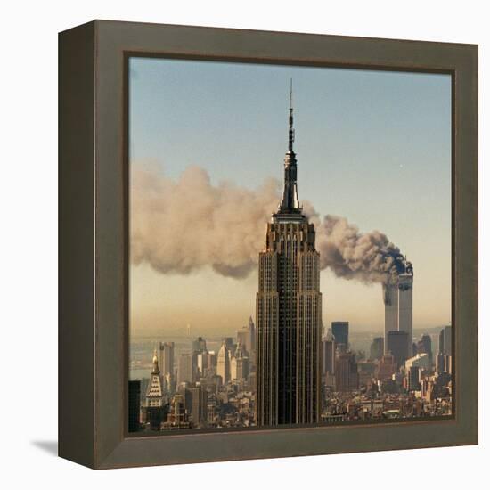 Twin Towers of the World Trade Center Burn Behind the Empire State Buildiing, September 11, 2001-null-Framed Premier Image Canvas