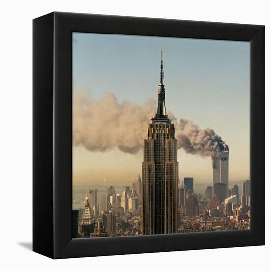 Twin Towers of the World Trade Center Burn Behind the Empire State Buildiing, September 11, 2001-null-Framed Premier Image Canvas