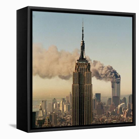 Twin Towers of the World Trade Center Burn Behind the Empire State Buildiing, September 11, 2001-null-Framed Premier Image Canvas