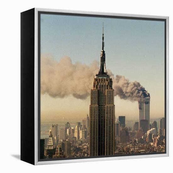 Twin Towers of the World Trade Center Burn Behind the Empire State Buildiing, September 11, 2001-null-Framed Premier Image Canvas