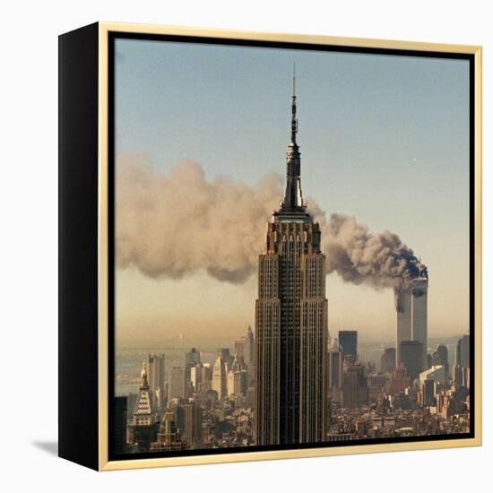 Twin Towers of the World Trade Center Burn Behind the Empire State Buildiing, September 11, 2001-null-Framed Premier Image Canvas