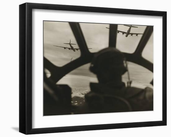 Two B-29 Super-Fortresses Drop Bombs over Malaya as Seen from the Cockpit of Third Bomber, 1943-45-null-Framed Photo