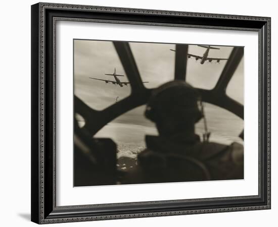 Two B-29 Super-Fortresses Drop Bombs over Malaya as Seen from the Cockpit of Third Bomber, 1943-45-null-Framed Photo