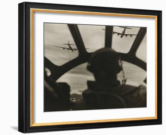 Two B-29 Super-Fortresses Drop Bombs over Malaya as Seen from the Cockpit of Third Bomber, 1943-45-null-Framed Photo