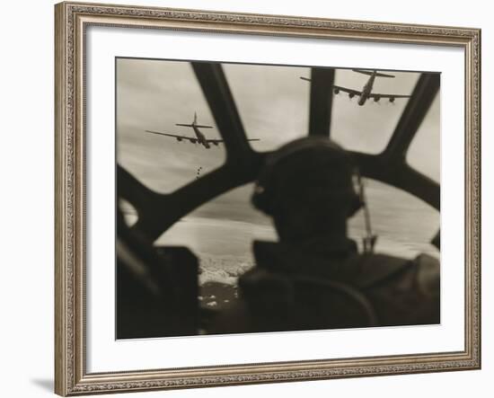 Two B-29 Super-Fortresses Drop Bombs over Malaya as Seen from the Cockpit of Third Bomber, 1943-45-null-Framed Photo