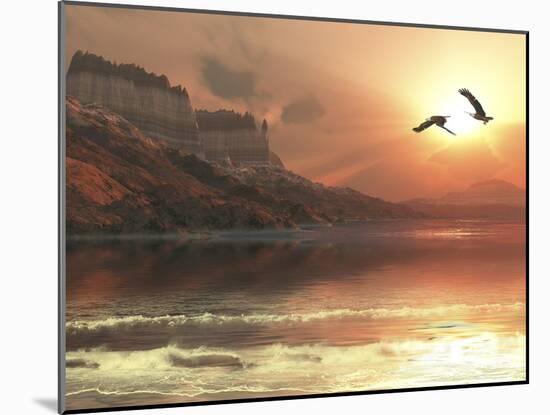 Two Bald Eagles Fly Along a Mountainous Coastline at Sunset-Stocktrek Images-Mounted Photographic Print