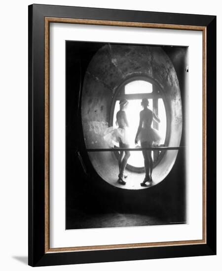 Two Ballerinas Standing in Window of the Paris Opera During Rehearsal of "Swan Lake"-Alfred Eisenstaedt-Framed Photographic Print