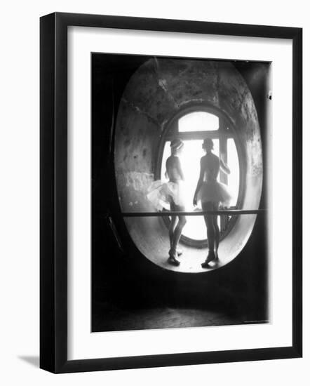 Two Ballerinas Standing in Window of the Paris Opera During Rehearsal of "Swan Lake"-Alfred Eisenstaedt-Framed Photographic Print