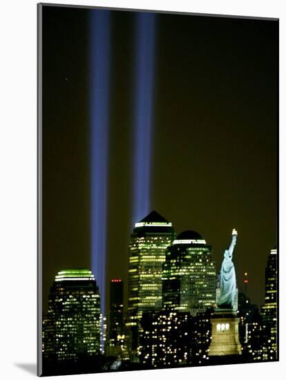 Two Beams of Light Light up the Sky Above Manhattan from Near the Site of the World Trade Center-null-Mounted Photographic Print