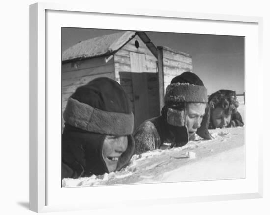 Two Boys and a Girl Up to Their Necks in a Snowdrift,Nibbling at the Snow-George Silk-Framed Photographic Print