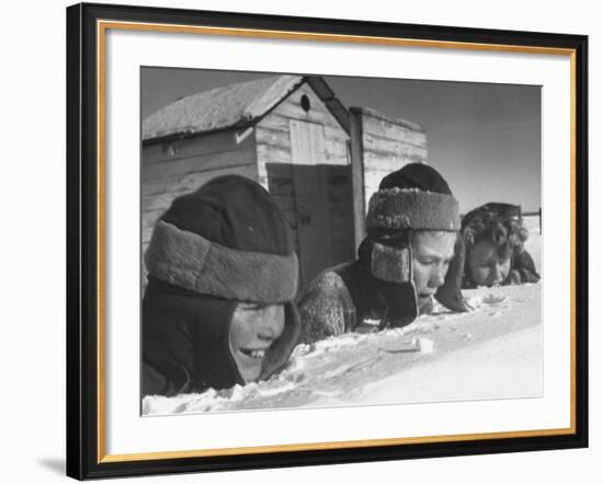Two Boys and a Girl Up to Their Necks in a Snowdrift,Nibbling at the Snow-George Silk-Framed Photographic Print