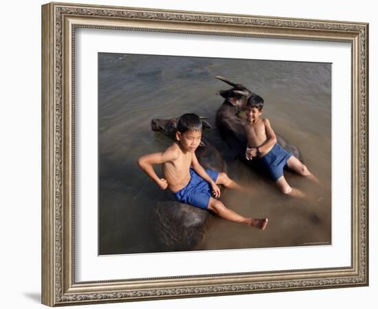 Two Boys Bathe with Their Water Buffalo in the Mekong River, Eastern Cambodia, Indochina-Andrew Mcconnell-Framed Photographic Print