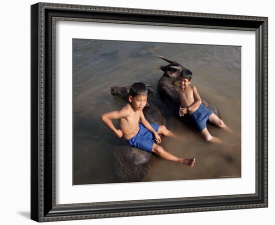 Two Boys Bathe with Their Water Buffalo in the Mekong River, Eastern Cambodia, Indochina-Andrew Mcconnell-Framed Photographic Print