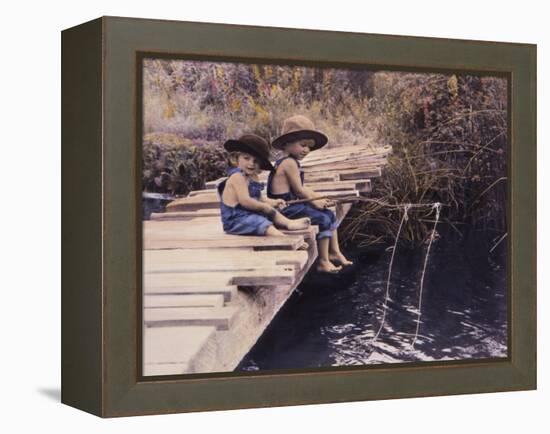 Two Boys Fishing Off of Bridge-Nora Hernandez-Framed Premier Image Canvas